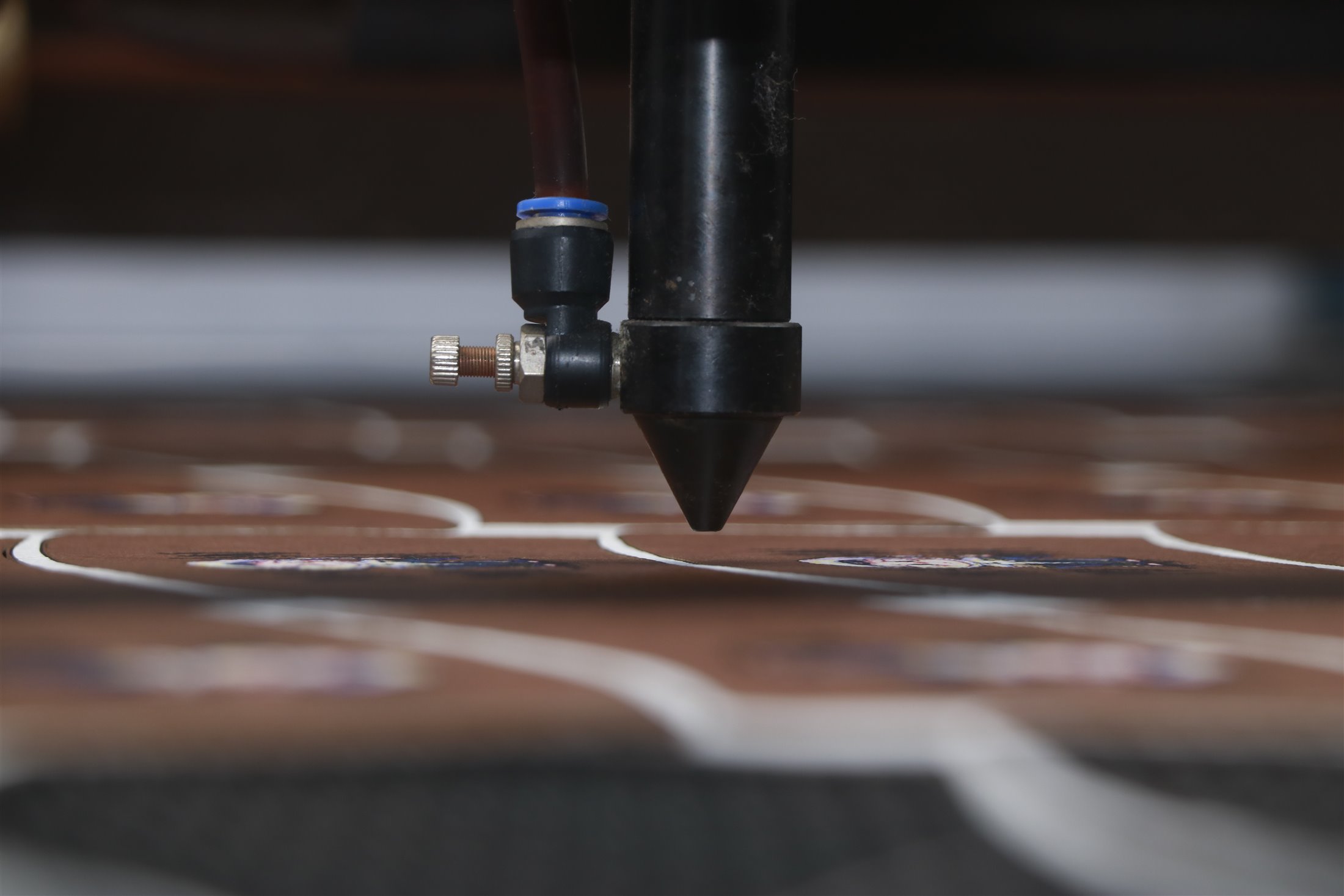 Close-up of precision logo printing process on fabric packaging